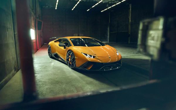 A yellow Lamborghini Huracan Performante supercar parked inside a dimly lit garage, captured in stunning 4K Ultra HD for a desktop wallpaper background.