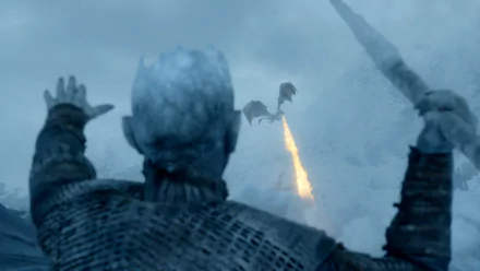 HD PC wallpaper of Night King and undead Viserion from the TV show Game of Thrones: Night King raises his hands as Viserion spews blue flame into a snowy, stormy sky.