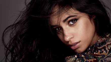 Close-up HD portrait of a Latina brunette singer with brown eyes, featuring Camila Cabello as a PC desktop wallpaper and background.