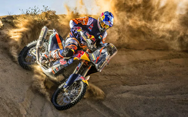 HD desktop wallpaper of a motocross rider kicking up dirt on a motorcycle, showcasing intense off-road sports action.