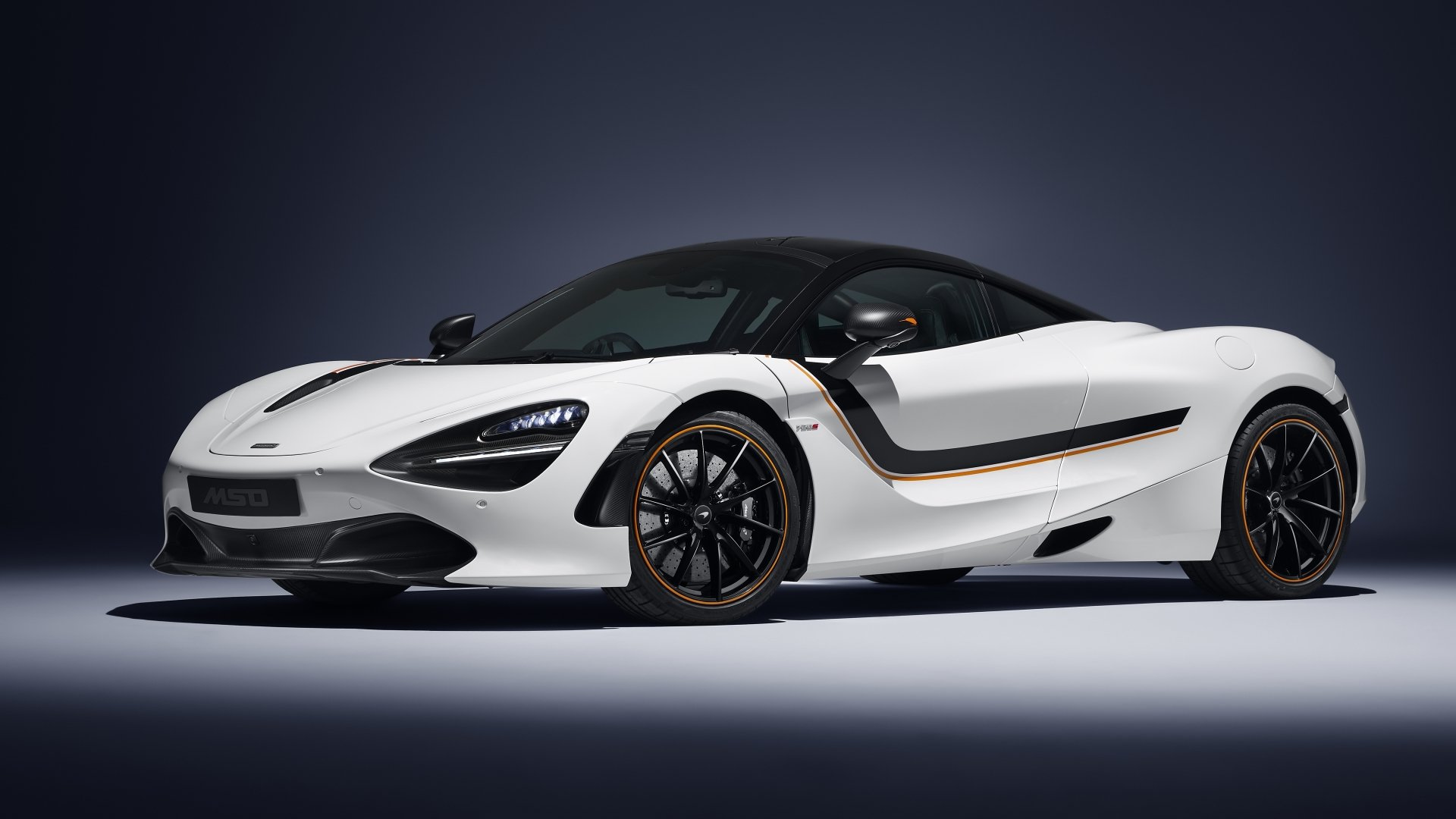 White McLaren 720S supercar on a dark studio backdrop, 5K Ultra HD PC desktop wallpaper/background.