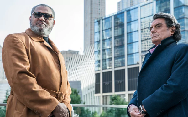 Laurence Fishburne and Ian McShane stand in front of modern buildings in this 4K Ultra HD wallpaper from John Wick: Chapter 3 - Parabellum.
