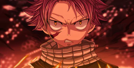 HD anime desktop wallpaper featuring Natsu Dragneel from Fairy Tail with intense eyes and fiery background.