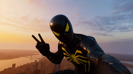 Spider-Man (PS4) in his black suit takes a selfie with a peace sign at sunset over the city in this 4K Ultra HD PC desktop wallpaper from the video game.