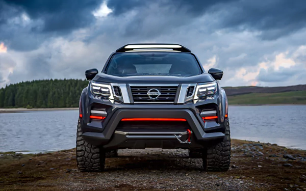 Front view of a Nissan Navara SUV car/vehicle parked by a lake under stormy skies — 4K Ultra HD PC desktop wallpaper and background.