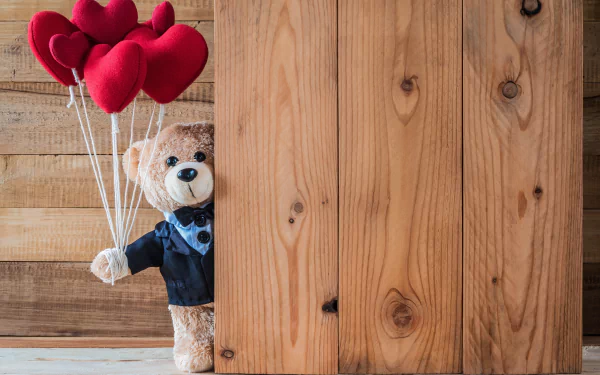 A teddy bear in a bow tie holding heart-shaped balloons against a wooden backdrop, suitable as a HD desktop wallpaper and background.