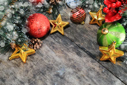 Christmas ornaments including baubles and golden stars arranged on rustic wood, captured as a vibrant 4K Ultra HD holiday desktop wallpaper background.