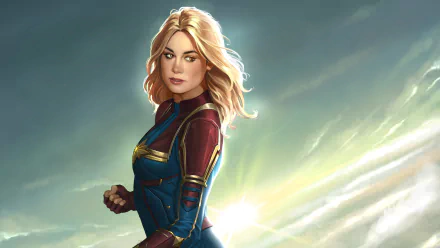 HD digital artwork of Carol Danvers as Captain Marvel, portrayed by Brie Larson, set against a bright, dynamic sky background for a desktop wallpaper.