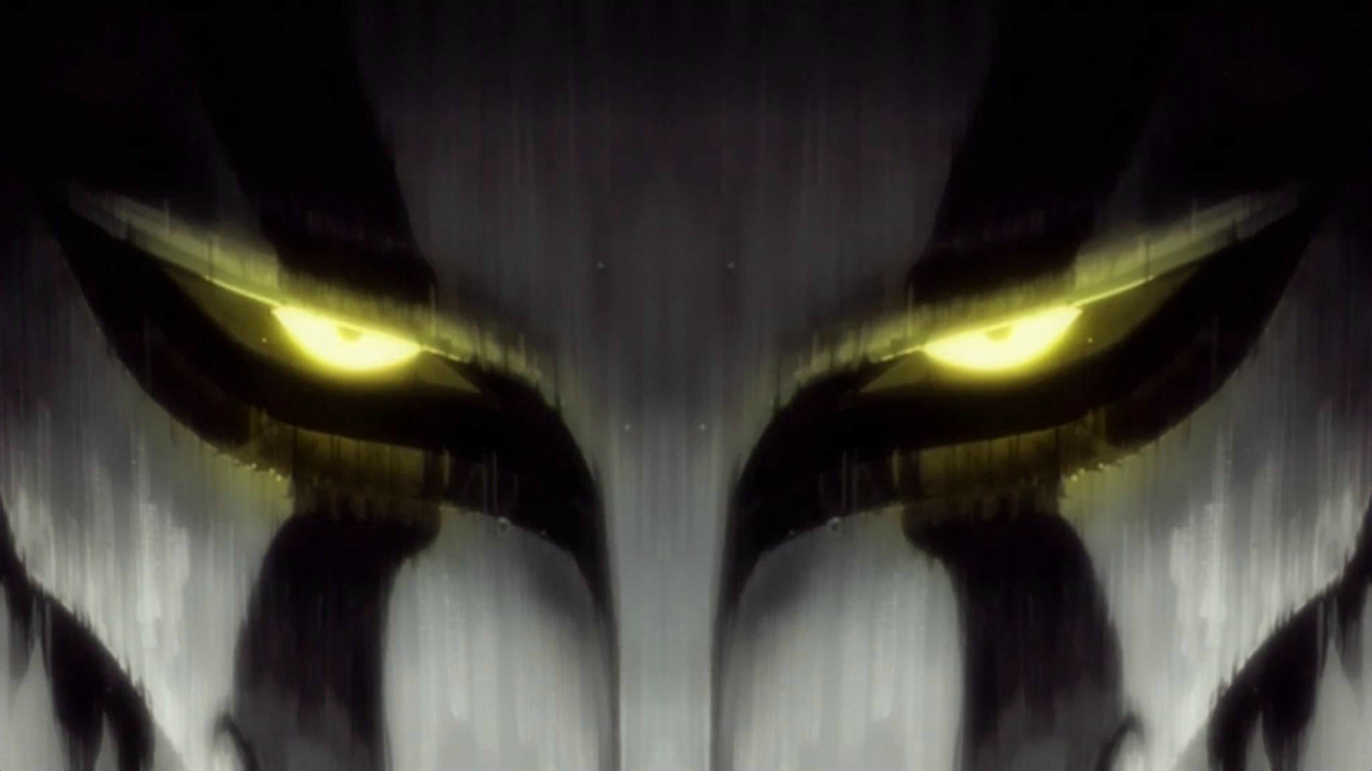 HD wallpaper featuring Ichigo Kurosaki from the anime Bleach, showcasing his intense eyes amidst a dark, dramatic background.