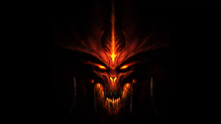 HD desktop wallpaper featuring a dark, ominous demon from the video game Diablo III, with burning eyes and flames accentuating its menacing appearance.