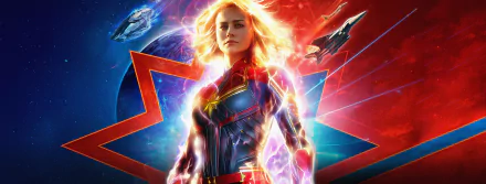 HD desktop wallpaper featuring Carol Danvers, portrayed by Brie Larson, in her Captain Marvel costume, against a vibrant cosmic background with spaceships.