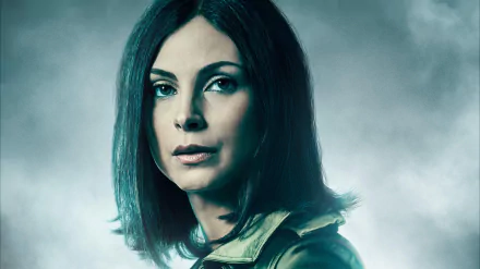 HD desktop wallpaper featuring Morena Baccarin as Leslie Thompkins from the TV show Gotham, set against a moody, foggy background.