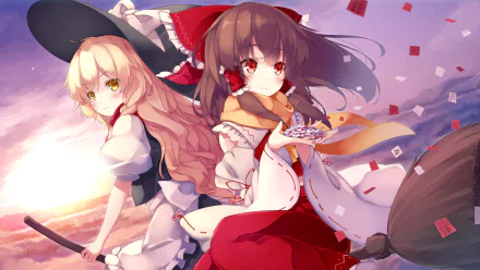 HD PC desktop wallpaper featuring anime characters Marisa Kirisame and Reimu Hakurei from the Touhou series in dynamic poses with vibrant colors.