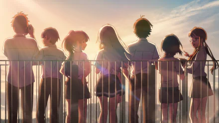 HD PC desktop wallpaper from the anime Iroduku: The World in Colors, featuring seven characters standing by a railing at sunset with a warm, glowing sky.
