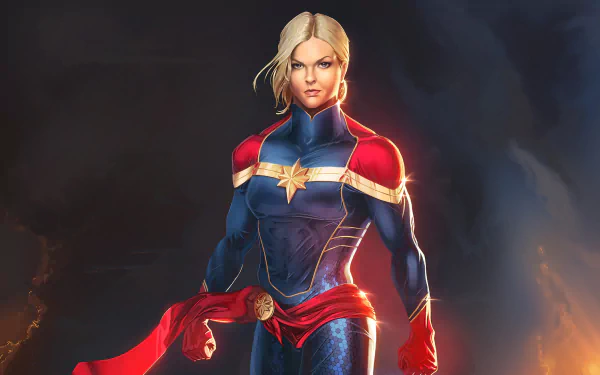 HD PC desktop wallpaper featuring a powerful comic-style Captain Marvel in her iconic blue and red suit, glowing with energy against a dark background.
