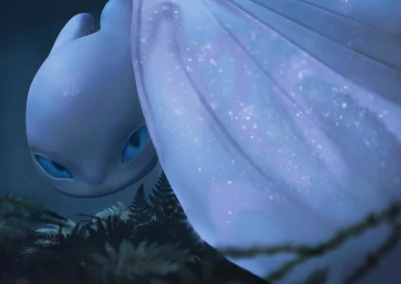 White Night Fury from the movie How to Train Your Dragon: The Hidden World — close-up with shimmering wing, 2K Quad HD PC desktop wallpaper.