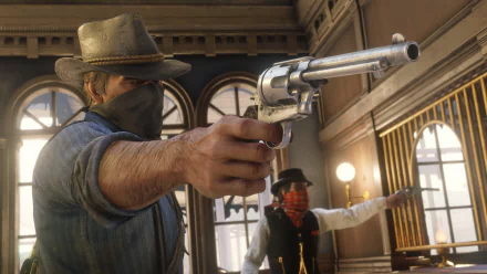 HD PC desktop wallpaper featuring Arthur Morgan from the video game Red Dead Redemption 2 aiming a revolver inside a vintage western building.