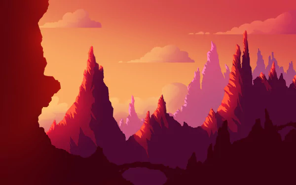 Artistic HD desktop wallpaper depicting sharp mountain peaks bathed in warm, glowing sunset hues, highlighting the natural beauty of a rugged landscape.