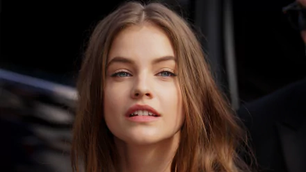 Close-up portrait of celebrity Barbara Palvin with natural makeup and loose hair, featured in a 4K Ultra HD PC desktop wallpaper background.